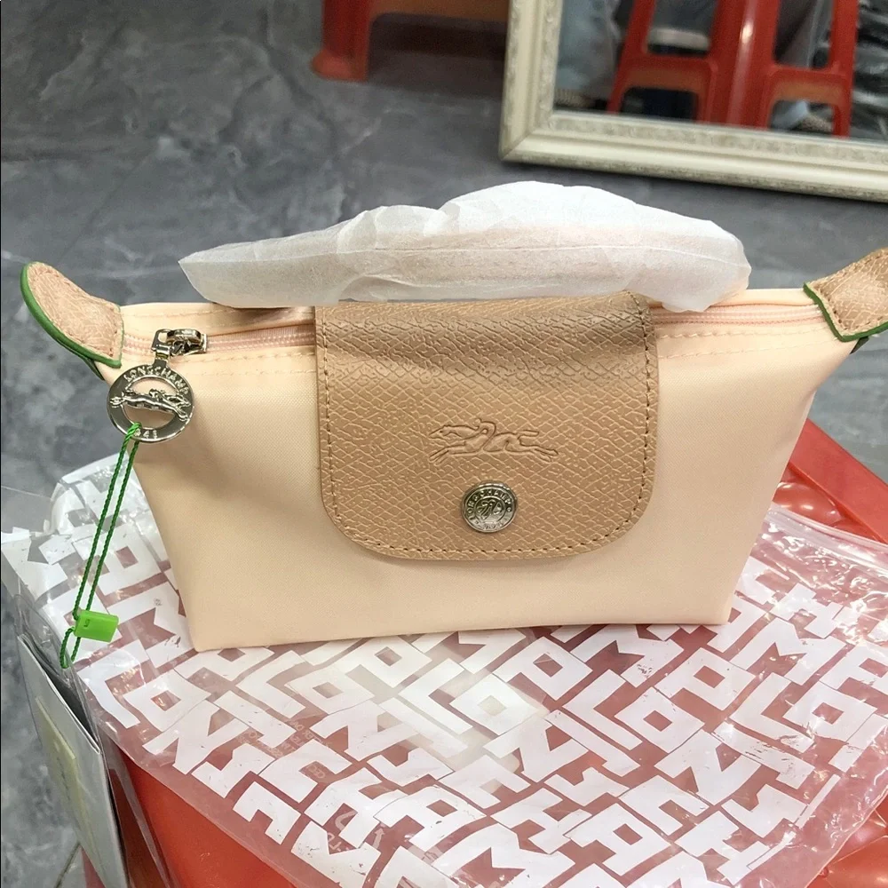 Longchamp Pale Peach Cosmetic Pouch with Tan Flap